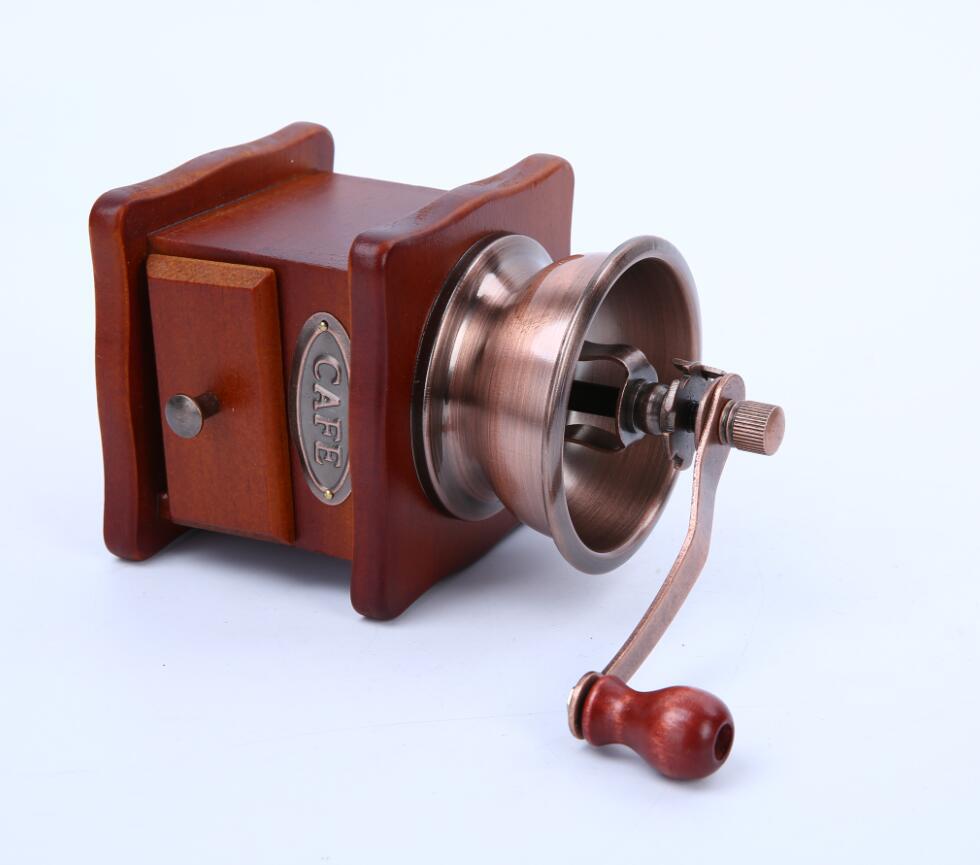 Explore our Hand Grinder - a coffee grinder designed with precision. Crafted from pine technology, cast iron, and ceramic materials, measuring 10x10x17cm. Ideal for 2-3 servings. Important note: Coffee beans contain oils, necessitating regular cleaning to avoid odors and ensure optimal performance. Maintain your high-quality beans with our easy-to-clean grinder.