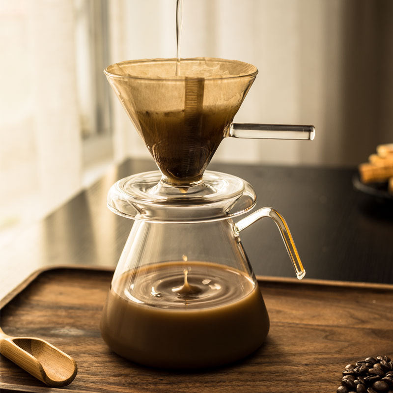 Barista-level control with our Pour Over Coffee Maker Set. Dual-layer filter for slow drips, rich flavor notes. Heat-resistant glass carafe for stove & microwave, zero odors. Easy to clean with wide opening and detachable dripper base. Elegant, space-saving base for a mess-free experience. Brew perfection, anytime, anywhere.