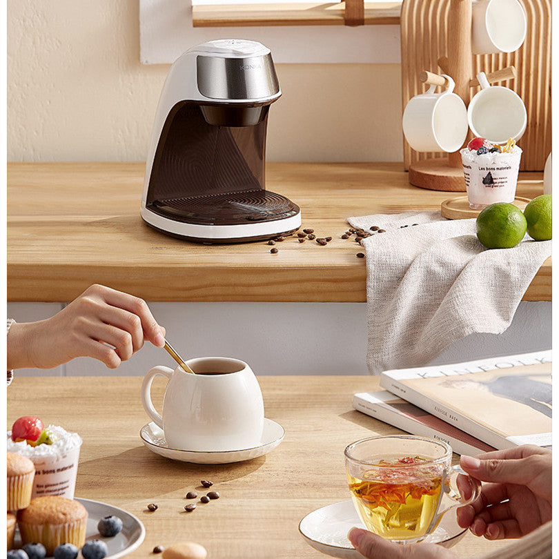 Experience coffee perfection with our drip-type coffee machine. Compact, versatile, and stylish in chic white, it operates globally, featuring durable stainless-steel build, semi-automatic operation, and easy maintenance. Ideal for any kitchen or office setup.